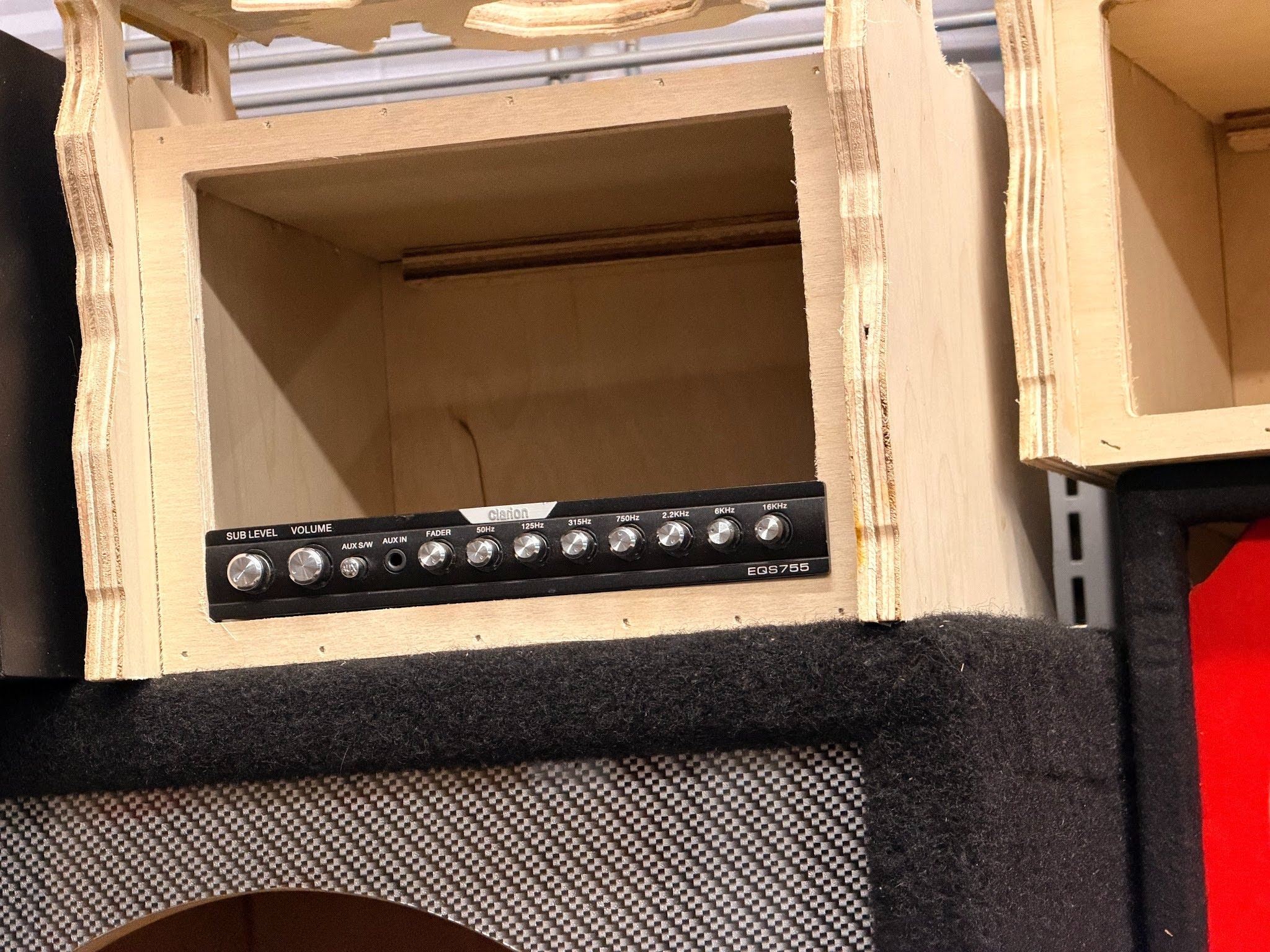 Clarion amplifier and EQ panel mounted in a custom enclosure